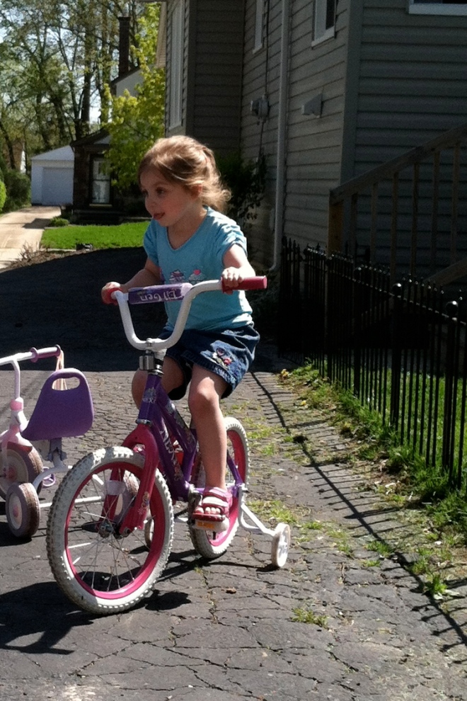 Cora LOVES riding her bike!!!! She's gotten really good at it too!