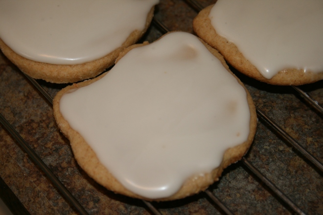 I made a thick glaze and shmeared that on each cookie for the trademark white Hello Kitty. It was smooth and hardened pretty a quickly, which is what I wanted. 
