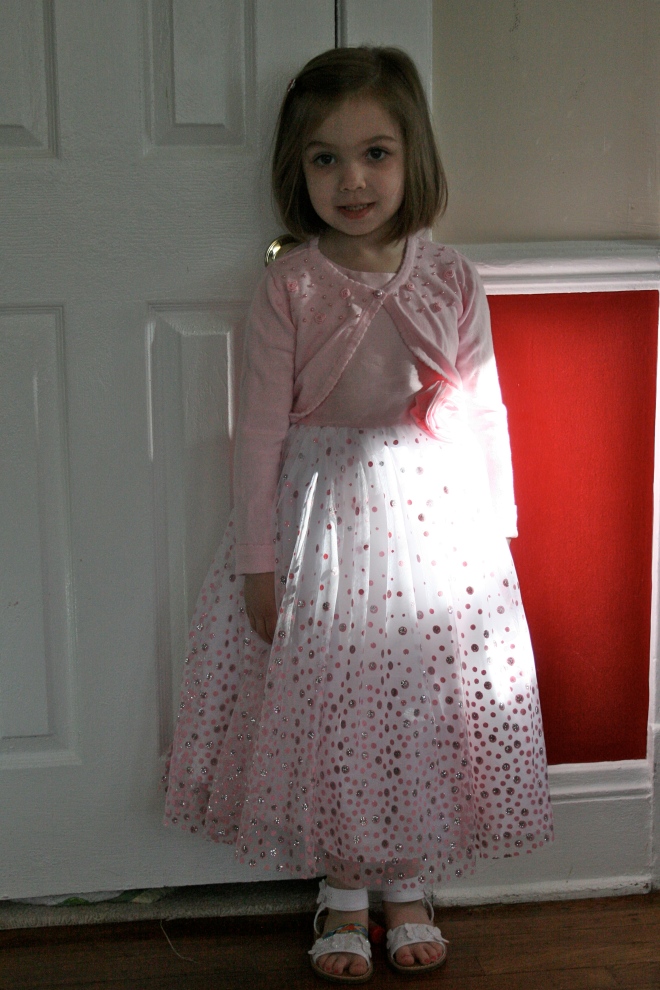 She very proudly picked this dress out herself. And, she was tickled that it got glitter all over the house, church, etc. :) 