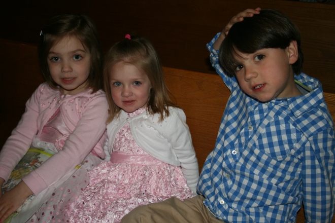 Cora and her cousins waiting for church to start.