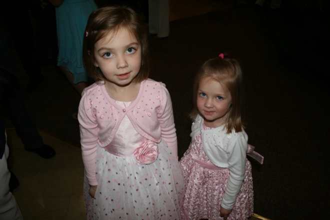 Cora and Haddie spent the morning at church walking around holding hands. 